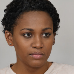 Neutral black young-adult female with short  brown hair and brown eyes