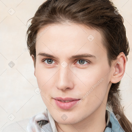 Neutral white young-adult female with medium  brown hair and grey eyes