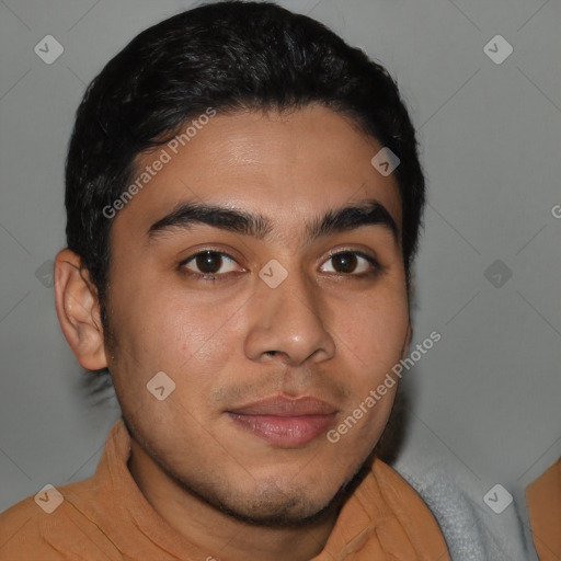 Joyful latino young-adult male with short  brown hair and brown eyes