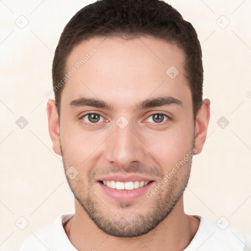 Joyful white young-adult male with short  brown hair and brown eyes