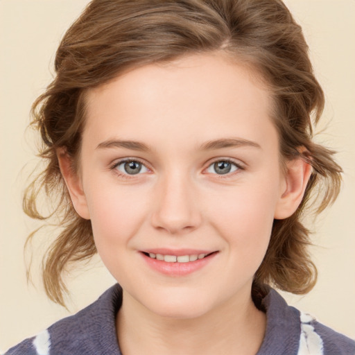 Joyful white child female with medium  brown hair and grey eyes