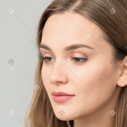 Neutral white young-adult female with long  brown hair and brown eyes