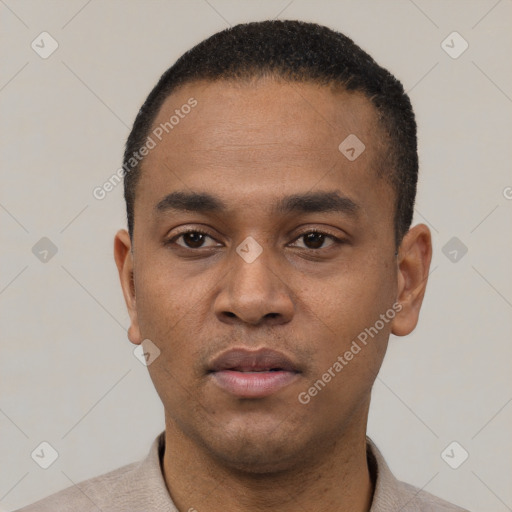 Neutral latino young-adult male with short  black hair and brown eyes