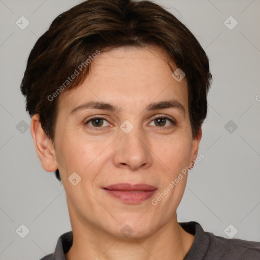 Joyful white adult female with short  brown hair and brown eyes