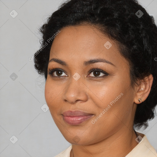 Joyful latino young-adult female with short  brown hair and brown eyes