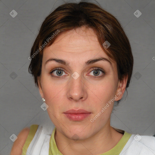 Neutral white young-adult female with short  brown hair and blue eyes