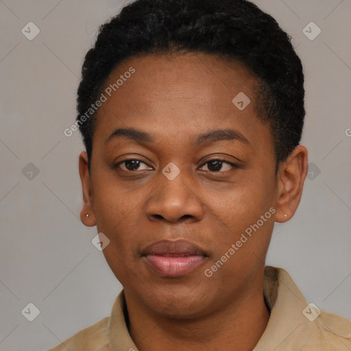 Joyful black young-adult female with short  black hair and brown eyes