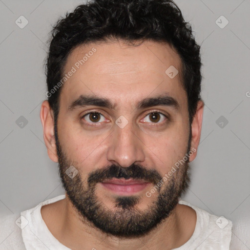 Joyful white young-adult male with short  black hair and brown eyes