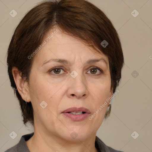 Joyful white adult female with medium  brown hair and grey eyes