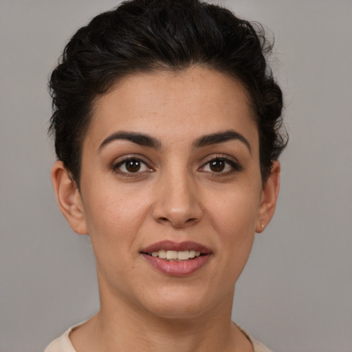Joyful white young-adult female with short  brown hair and brown eyes