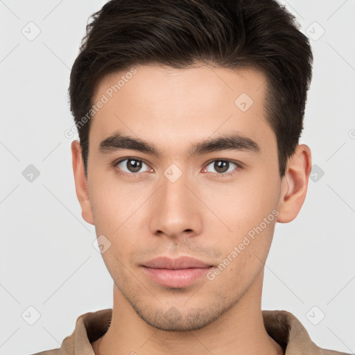 Neutral white young-adult male with short  brown hair and brown eyes