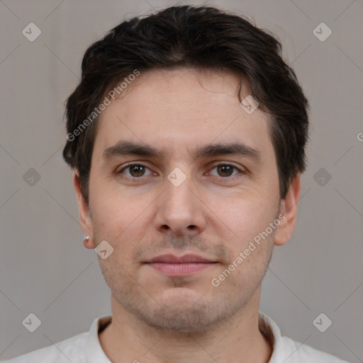 Neutral white young-adult male with short  brown hair and brown eyes