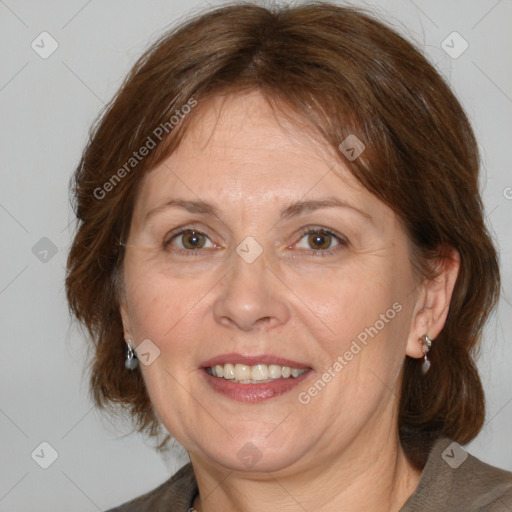 Joyful white adult female with medium  brown hair and grey eyes