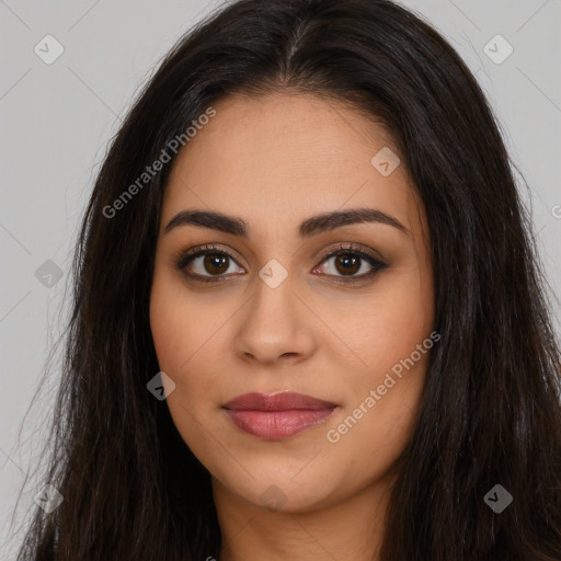 Joyful latino young-adult female with long  brown hair and brown eyes