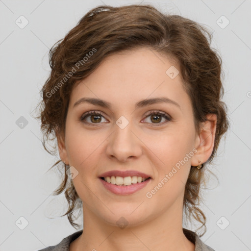 Joyful white young-adult female with medium  brown hair and green eyes