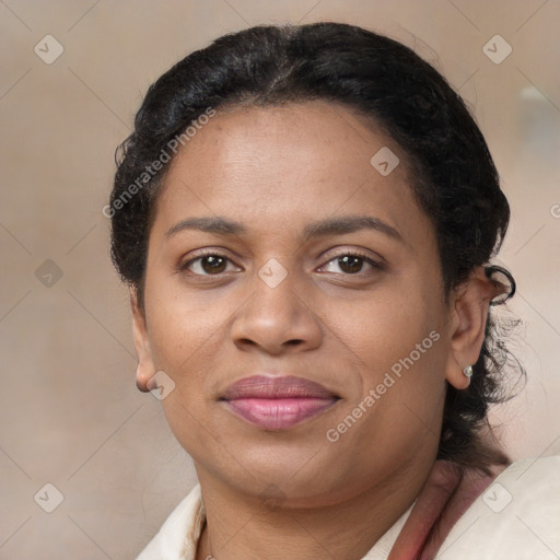 Joyful latino young-adult female with short  brown hair and brown eyes