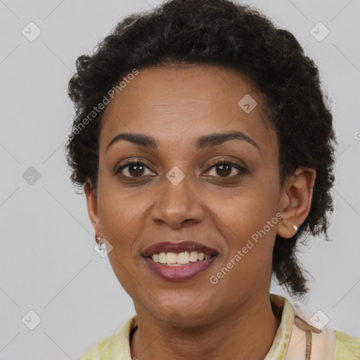 Joyful latino young-adult female with short  brown hair and brown eyes