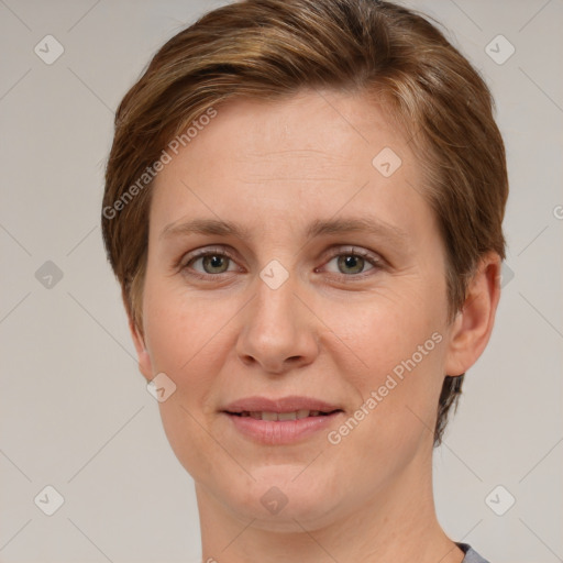 Joyful white young-adult female with short  brown hair and grey eyes