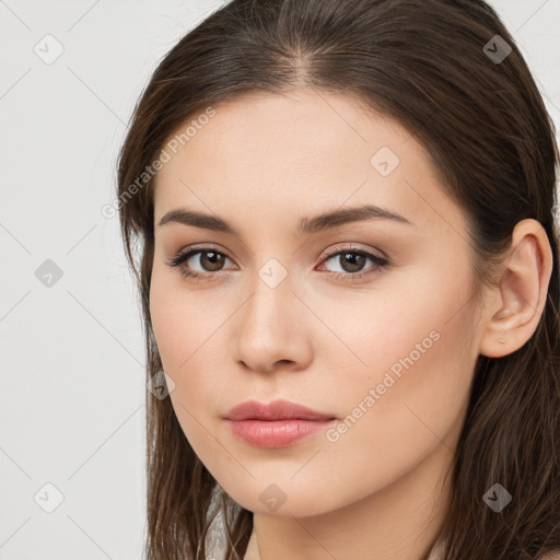 Neutral white young-adult female with long  brown hair and brown eyes