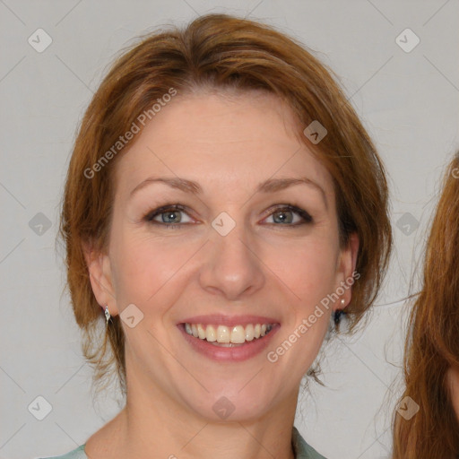 Joyful white young-adult female with medium  brown hair and blue eyes