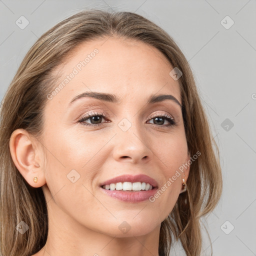 Joyful white young-adult female with long  brown hair and brown eyes