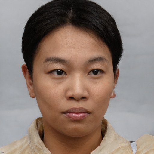 Neutral asian young-adult female with short  brown hair and brown eyes