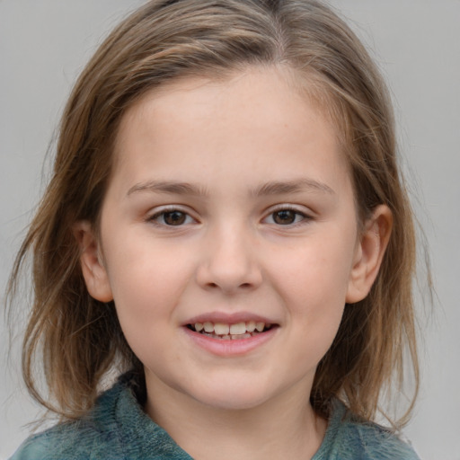 Joyful white child female with medium  brown hair and grey eyes