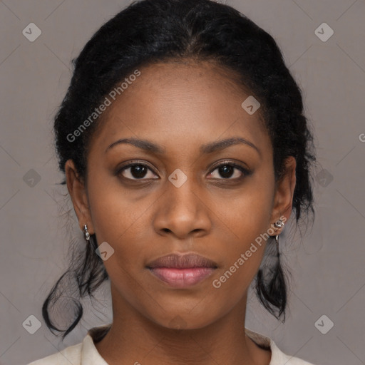 Joyful black young-adult female with medium  black hair and brown eyes