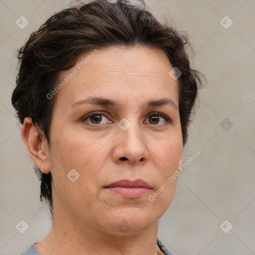 Joyful white adult female with short  brown hair and brown eyes