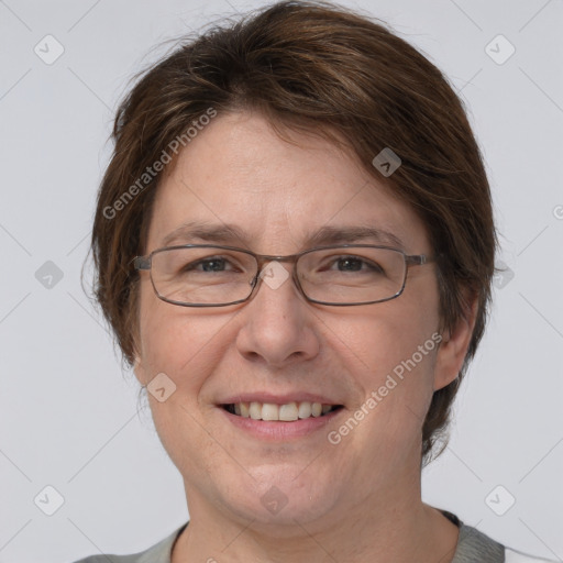 Joyful white adult female with short  brown hair and grey eyes