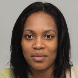 Joyful asian young-adult female with long  brown hair and brown eyes