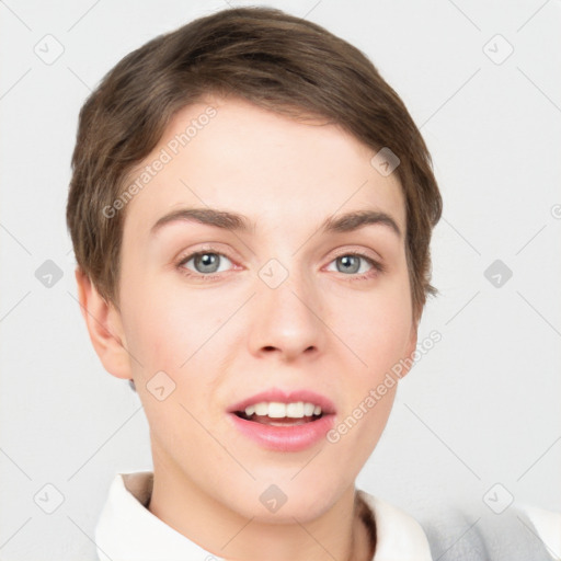 Joyful white young-adult female with short  brown hair and grey eyes