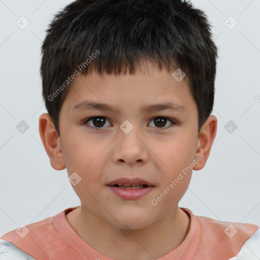 Joyful white child male with short  brown hair and brown eyes