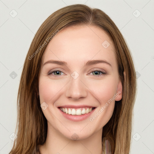 Joyful white young-adult female with long  brown hair and green eyes