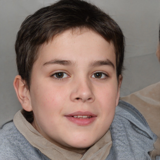 Joyful white child male with short  brown hair and brown eyes