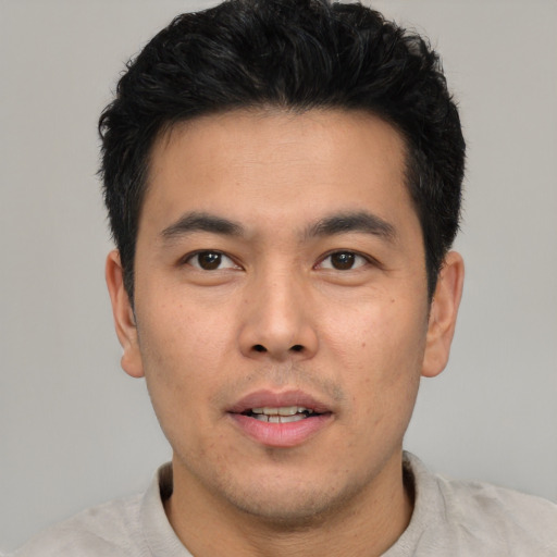 Neutral asian young-adult male with short  brown hair and brown eyes