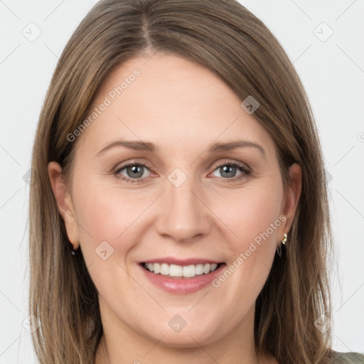 Joyful white young-adult female with long  brown hair and grey eyes