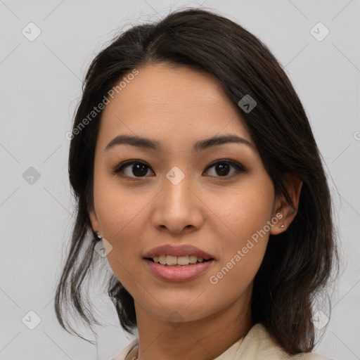 Joyful asian young-adult female with medium  black hair and brown eyes