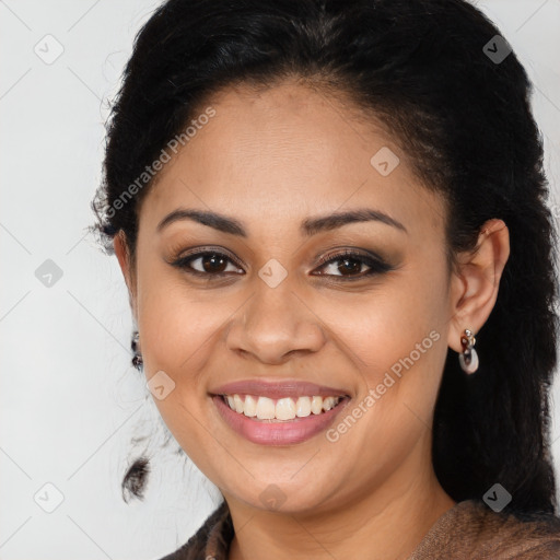 Joyful black young-adult female with medium  brown hair and brown eyes