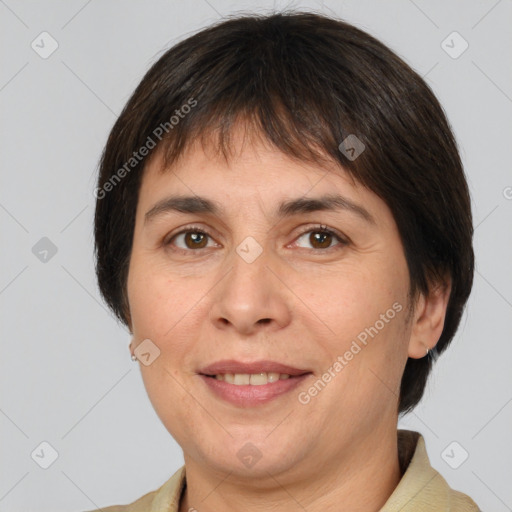 Joyful white adult female with short  brown hair and brown eyes