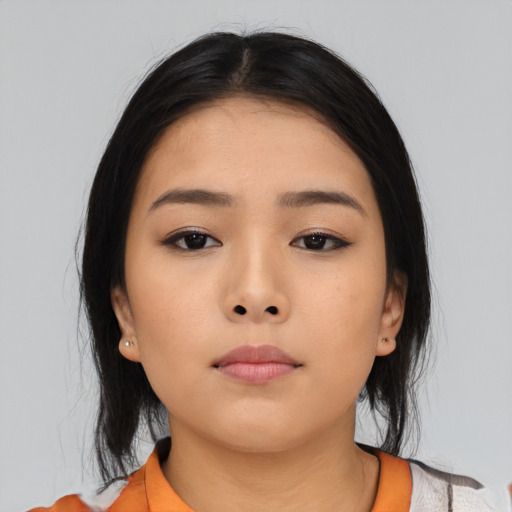 Neutral asian young-adult female with medium  black hair and brown eyes