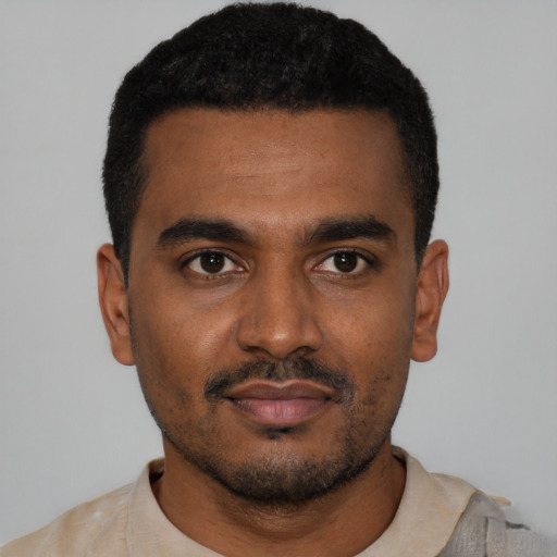 Neutral black young-adult male with short  black hair and brown eyes