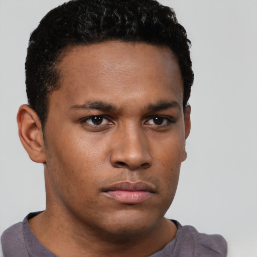 Neutral black young-adult male with short  brown hair and brown eyes