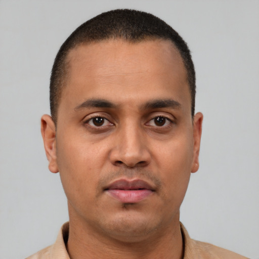 Neutral latino young-adult male with short  brown hair and brown eyes