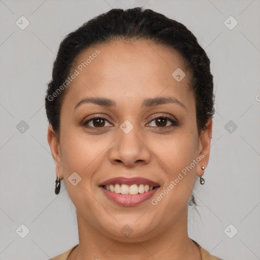 Joyful latino young-adult female with short  brown hair and brown eyes