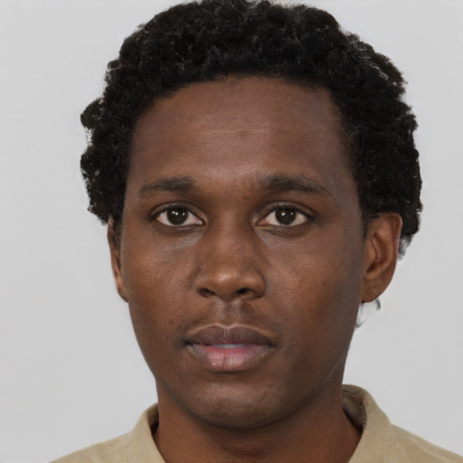 Neutral black young-adult male with short  brown hair and brown eyes