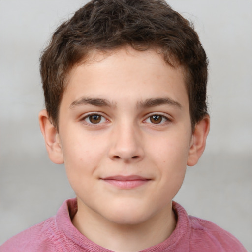 Joyful white child male with short  brown hair and brown eyes