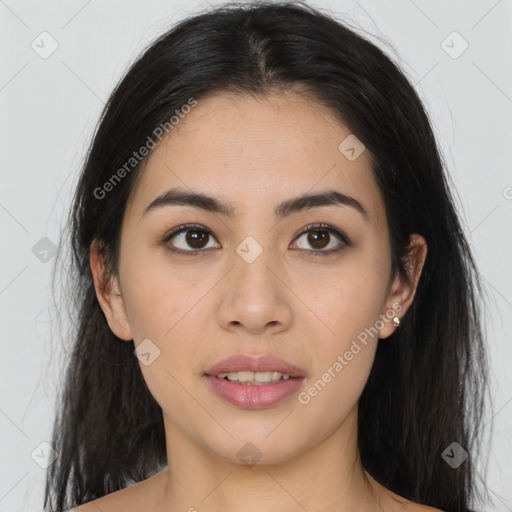 Joyful asian young-adult female with long  brown hair and brown eyes