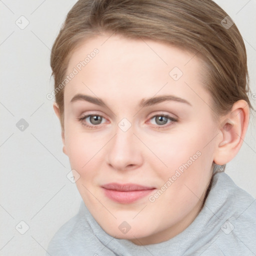 Joyful white young-adult female with medium  brown hair and blue eyes