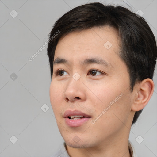 Neutral white young-adult male with short  brown hair and brown eyes